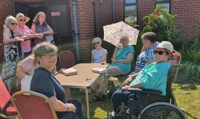 Book club taking advantage of the sunshine